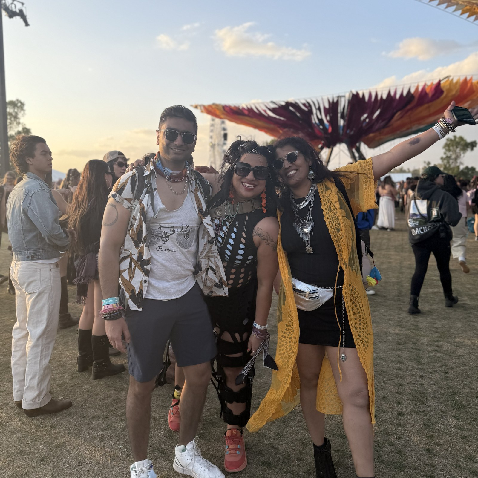 Threads of Joy co-founders Shantanu Mukherjee, Sayoni Banerjee, and Anupama Gavirneni together at a community festival.